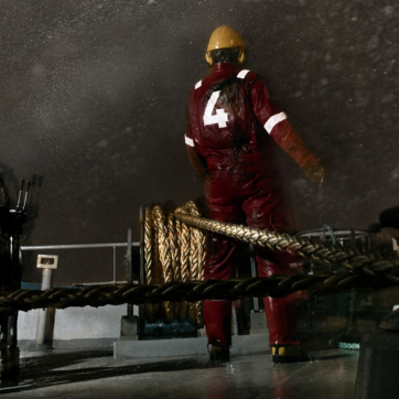 Offshore worker at night with reflective tape