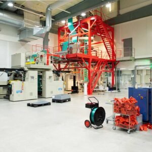 warehouse ith extruder machine in a production location